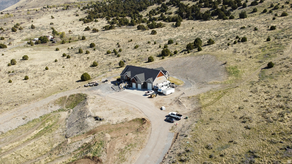 Aerial view of property and surrounding area featuring a desert landscape and rural landscape