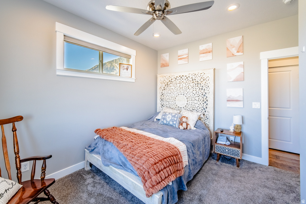 Bedroom with ceiling fan, carpet, and recessed lighting