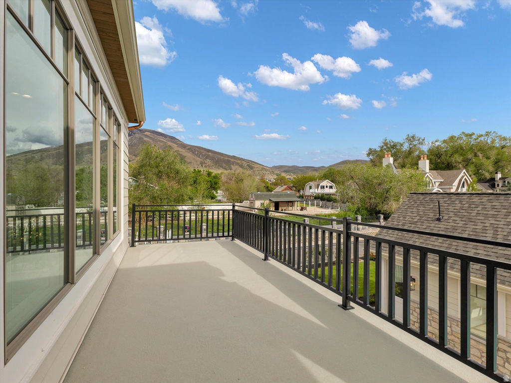 Balcony with a mountain view and a residential view