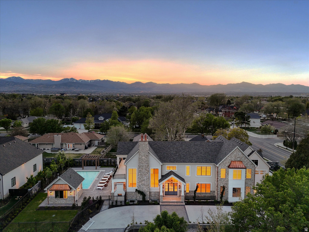 Aerial view at dusk of a mountain view and a residential view