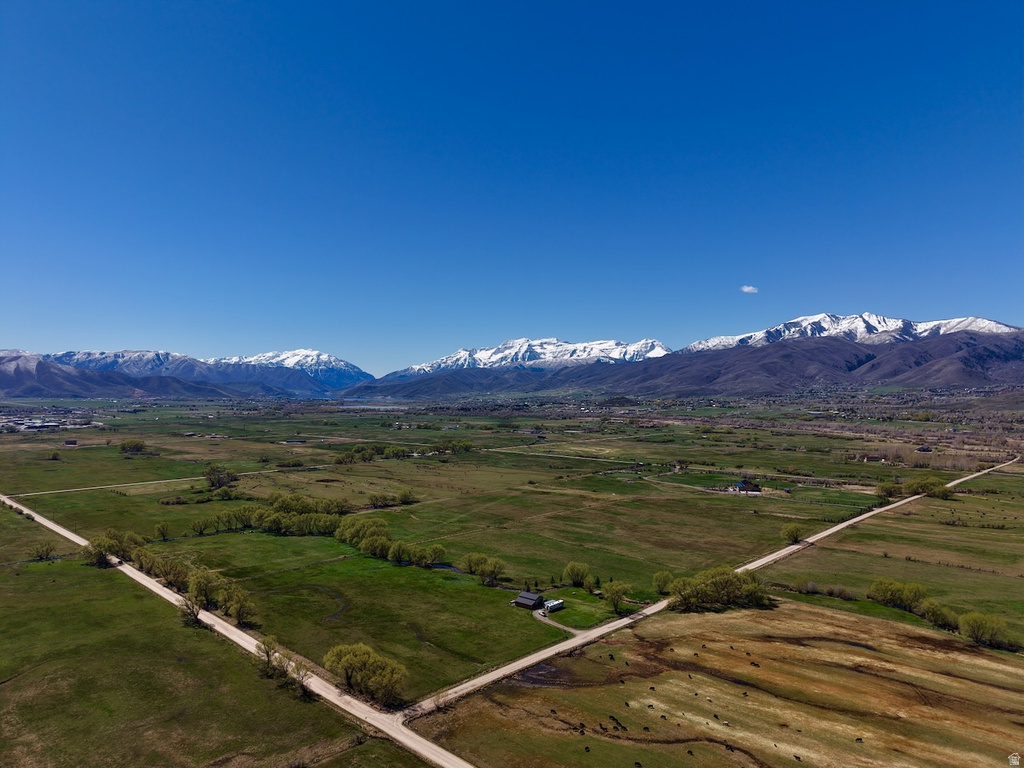 View of mountain backdrop featuring rural landscape