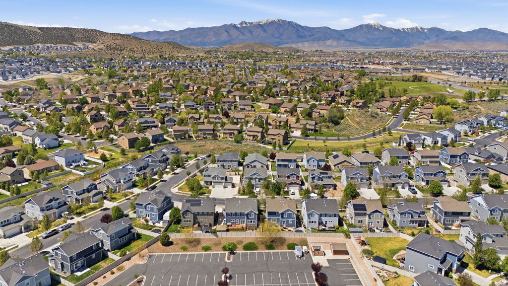 Expansive aerial perspective showcasing a residential development with varied housing styles
