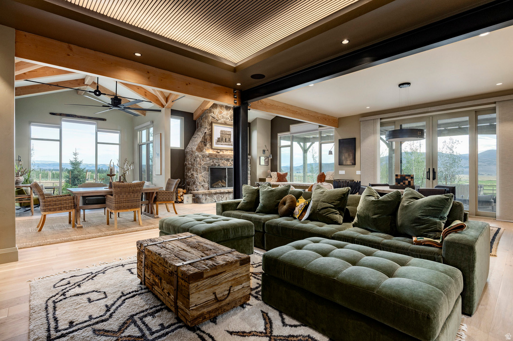 Open concept living area with light wood-finish flooring