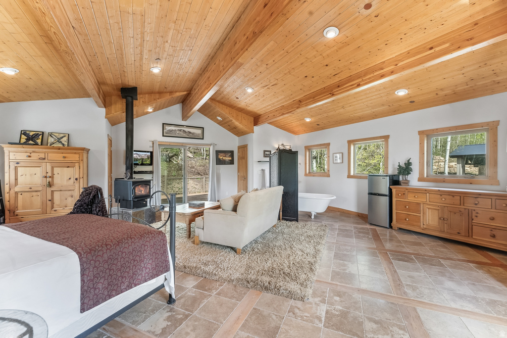 Vaulted wood-paneled ceilings with exposed beams