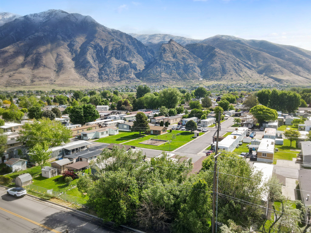 Aerial perspective showcasing the community surrounded by mountainous terrain