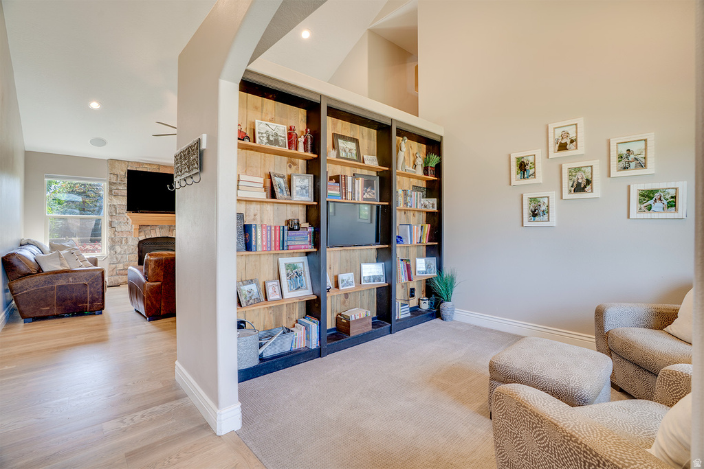 Built-in shelving unit with wood-finish backing and dark frames