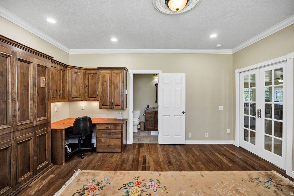 Custom built-in wood cabinetry with integrated desk space