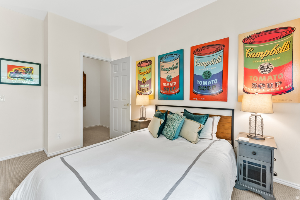 Bedroom featuring carpet flooring and a neutral color palette