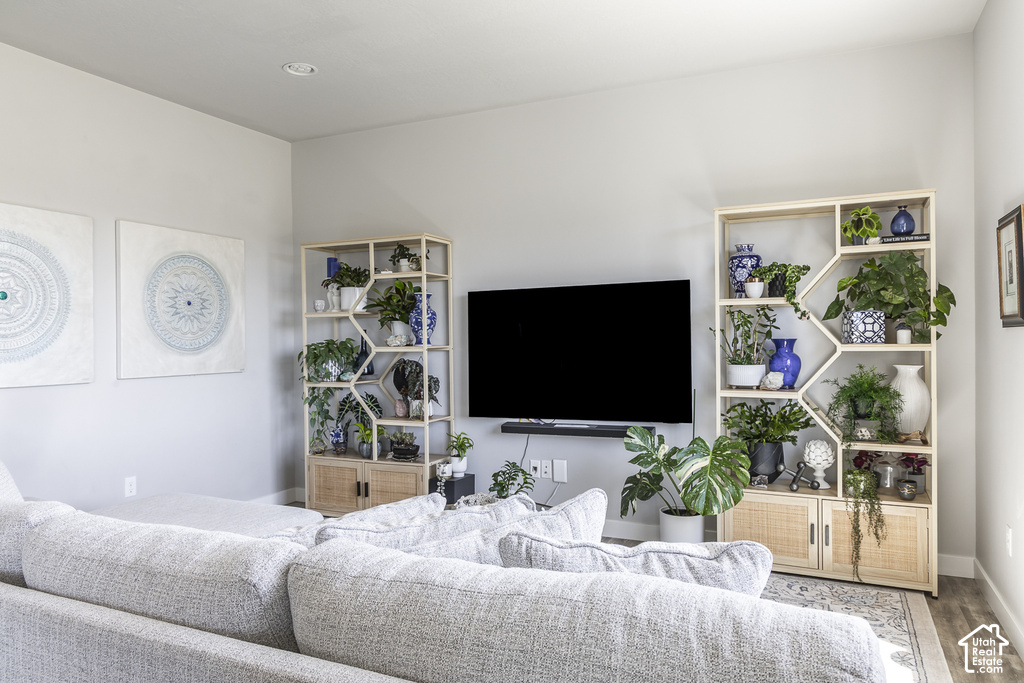 Recessed lighting illuminates neutral-toned walls