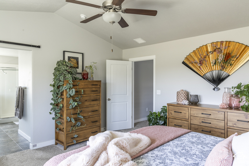 Vaulted ceiling with a ceiling fan