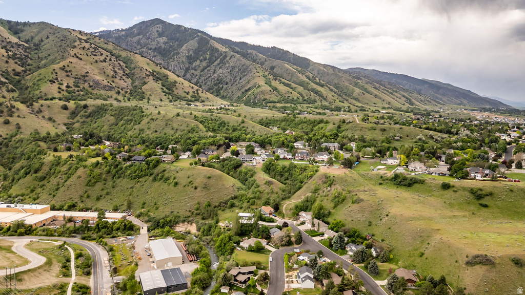 Mountainous landscape featuring residential areas and natural terrain