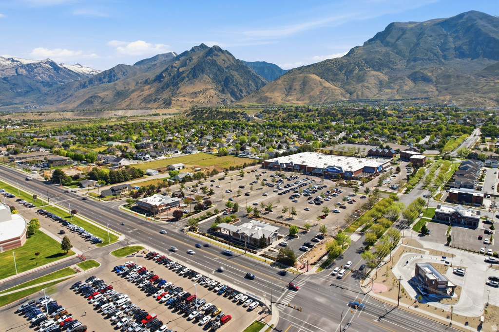 Expansive commercial property featuring a large retail building with extensive surface parking