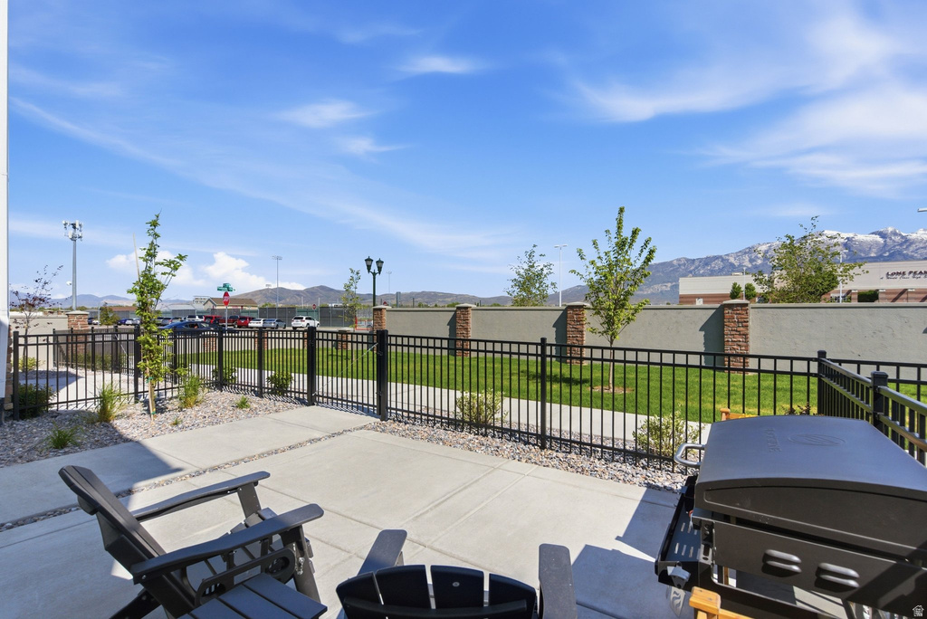 Outdoor patio with concrete pavers and gravel accents