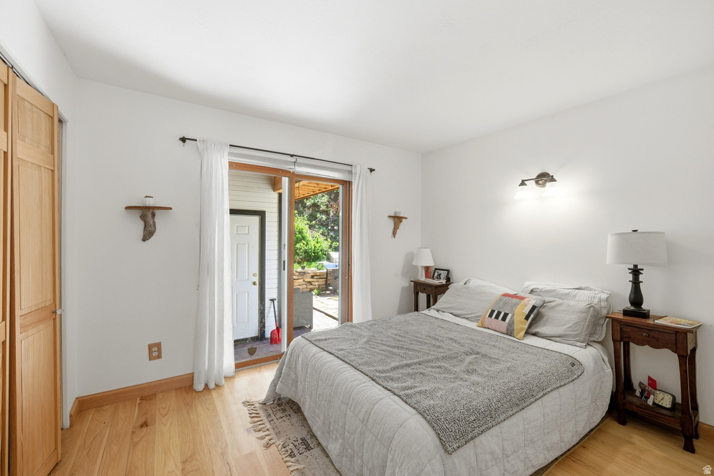 Light wood-finish flooring with white walls