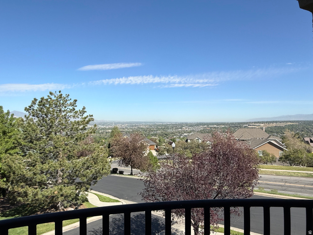 Expansive mountain and city scenery from a private balcony