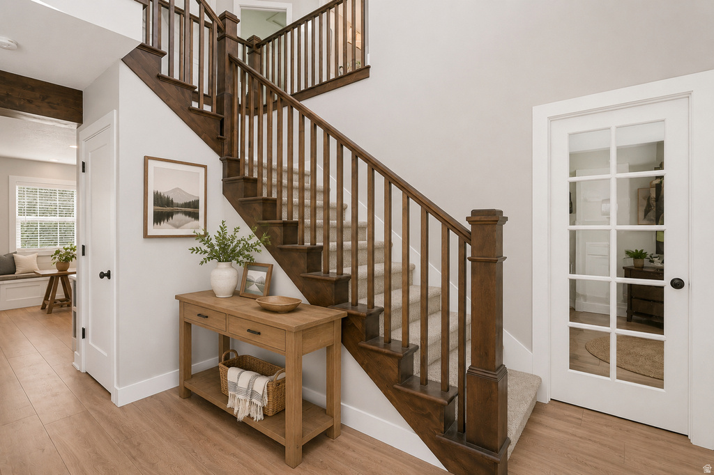 Wood-finish flooring throughout the entry