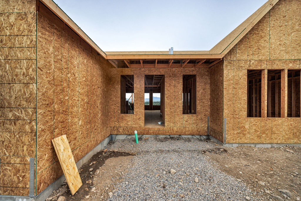 New construction framing with oriented strand board sheathing and a pitched roofline
