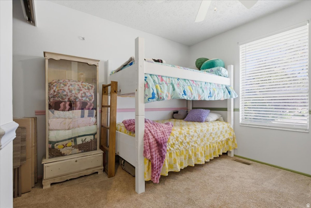 Room featuring a neutral carpet flooring and white walls