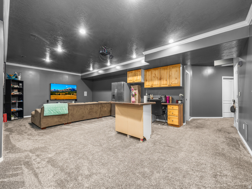 Spacious room featuring gray walls and ceiling with recessed lighting