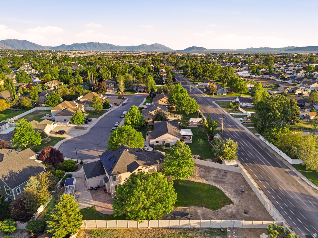 Aerial representation of a residential neighborhood with mountain backdrops