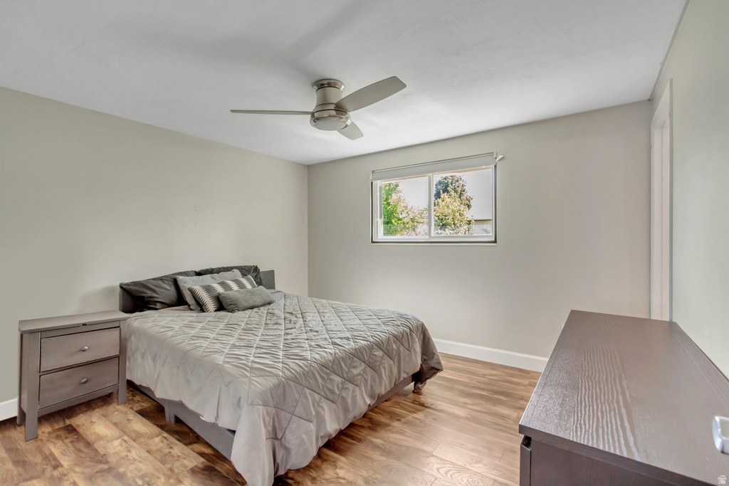 Neutral wall tones with wood-finish flooring