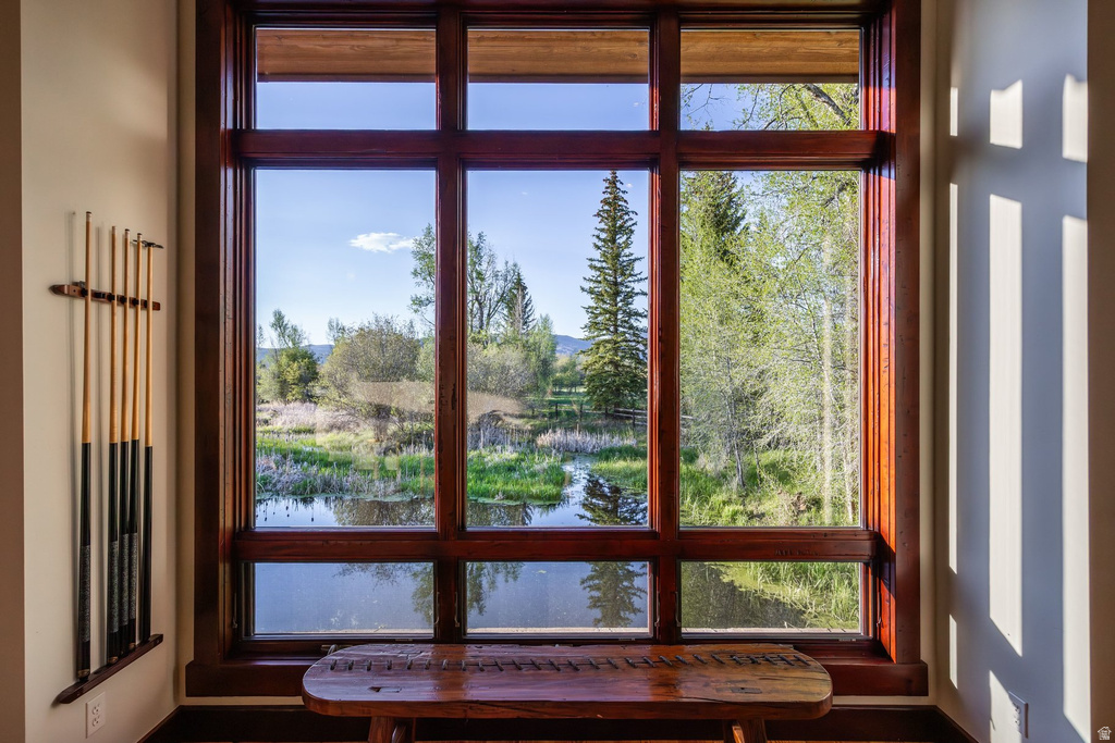 Expansive picture window with rich wood framing
