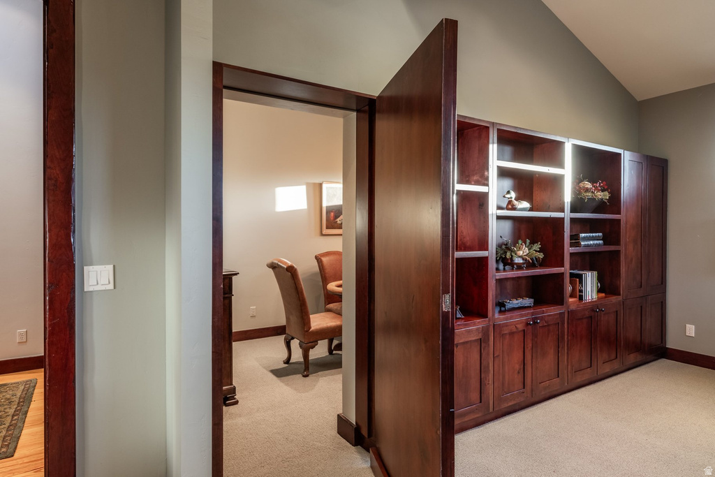 Built-in wood cabinetry with integrated shelving and lower storage