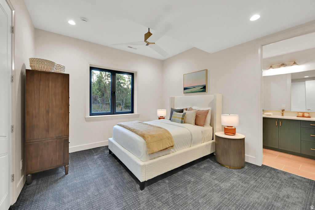 Bedroom featuring recessed lighting, a modern ceiling fan with gold accents, and patterned carpet flooring