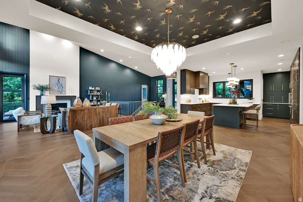 Open-concept interior featuring wood-finish flooring in a herringbone pattern