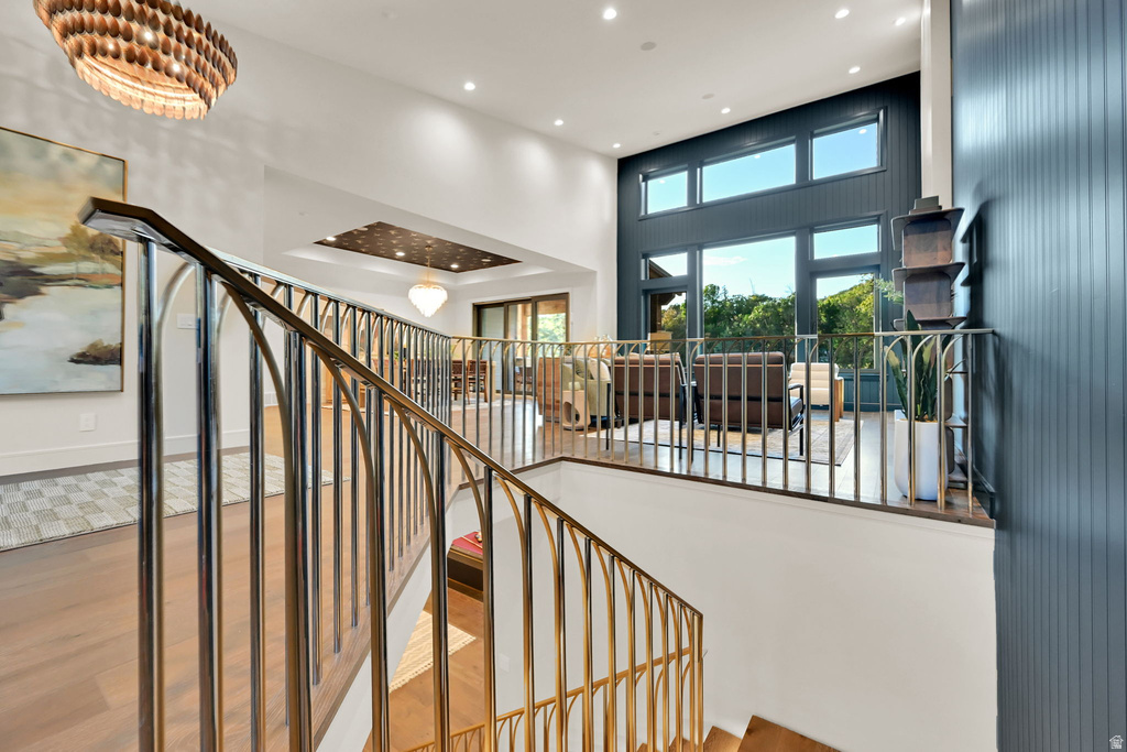 Hardwood staircase with polished metal balusters