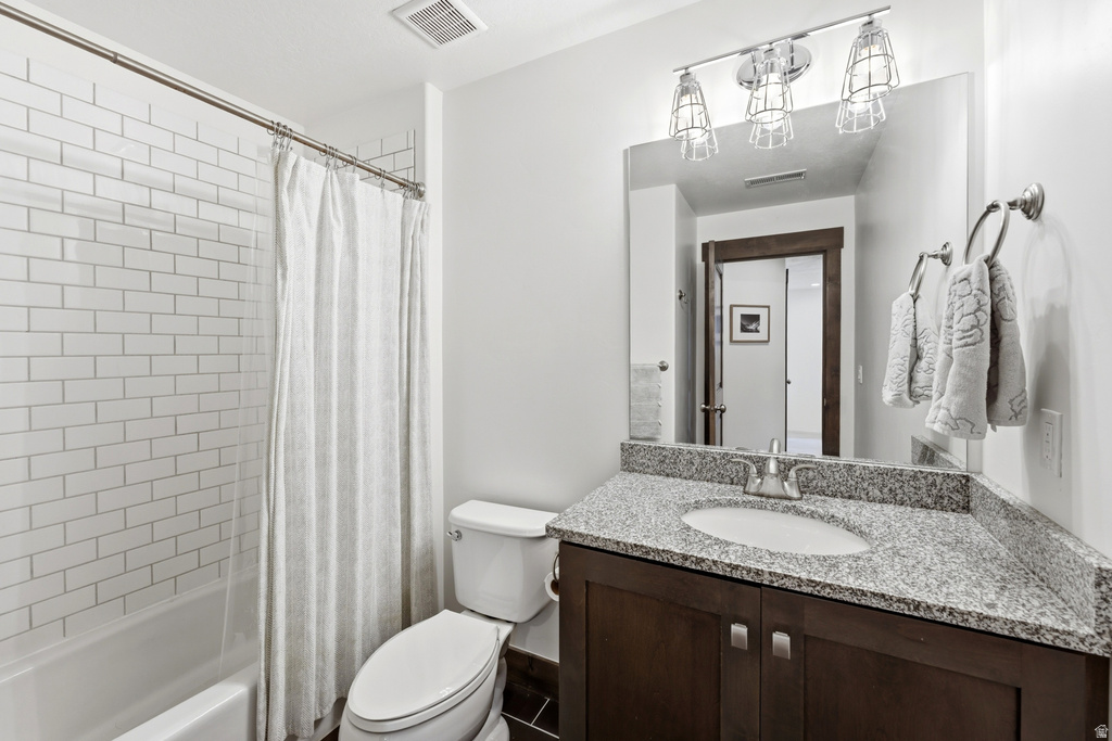 Subway tile shower surround with a white tub