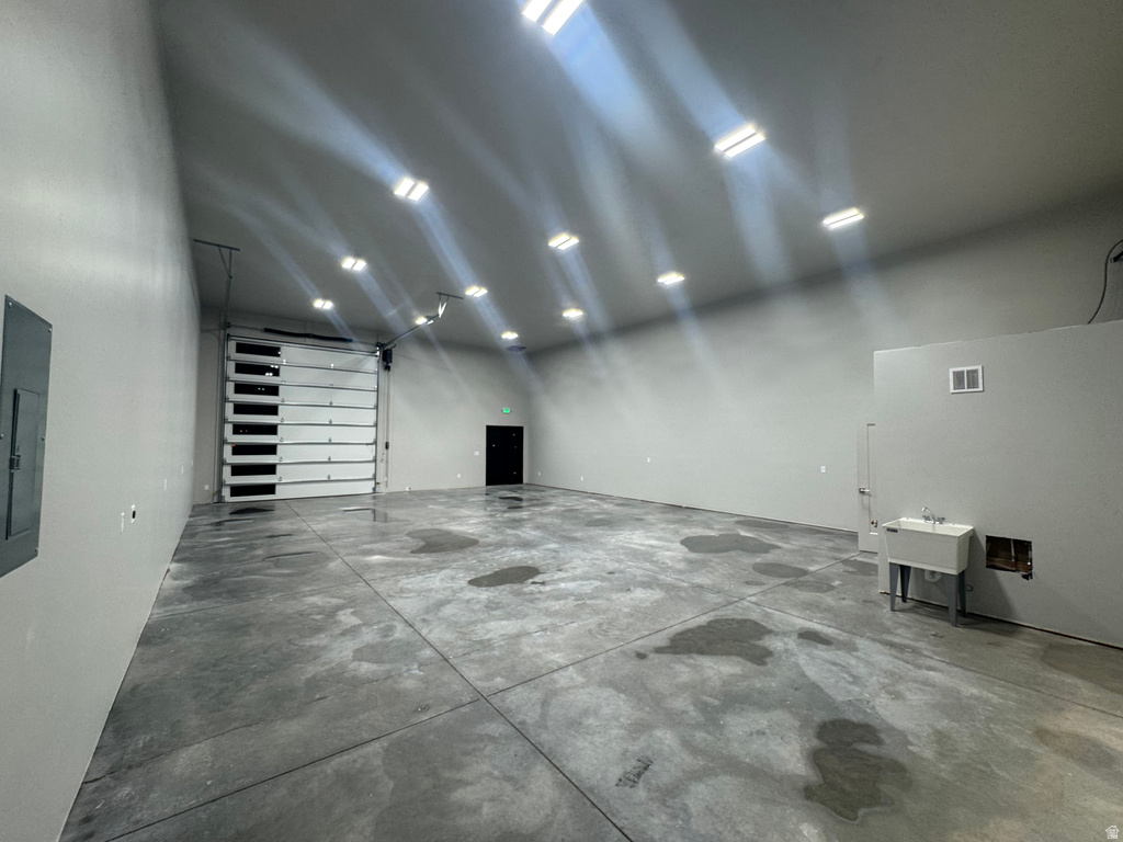 Spacious interior with high ceilings and polished concrete flooring