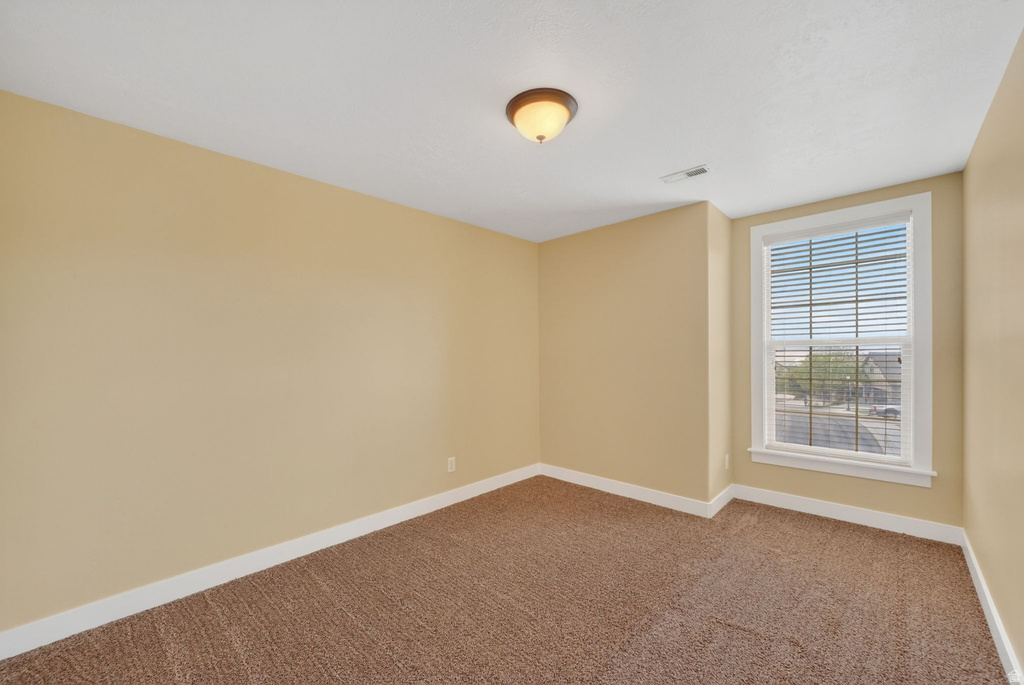 Neutral-toned wall finishes with white trim accents
