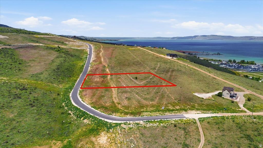 Undeveloped lot with waterfront potential