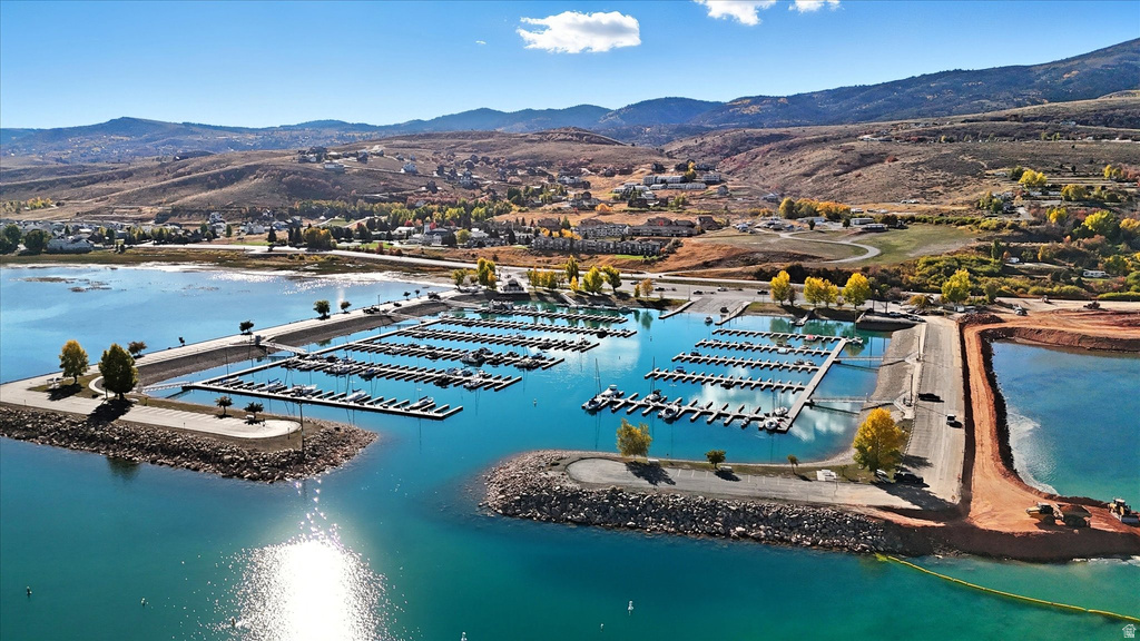 Bear Lake marina with multiple boat slips and rock breakwaters