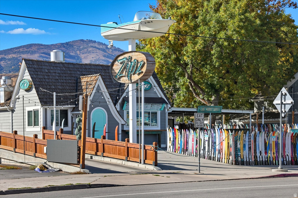 Commercial Property. Exterior view of a retail structure with associated signage and merchandise displays