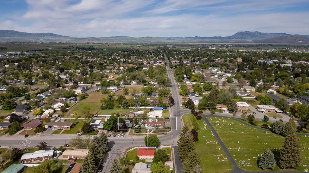 Aerial perspective showcasing the property within a residential setting