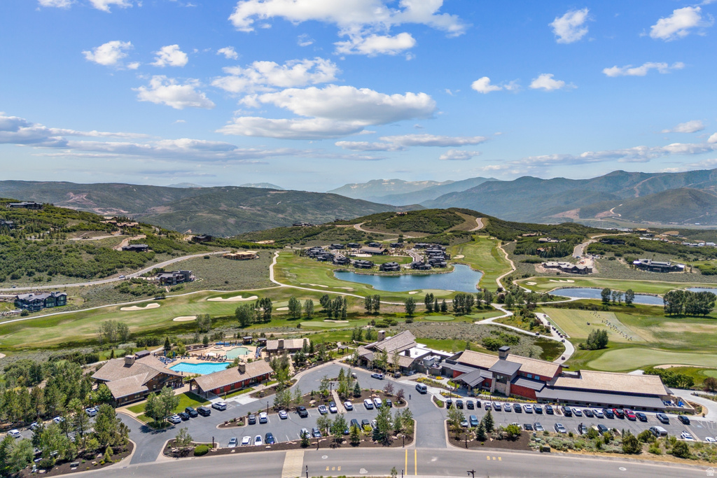 Expansive golf course community featuring multiple water features and mountain scenery
