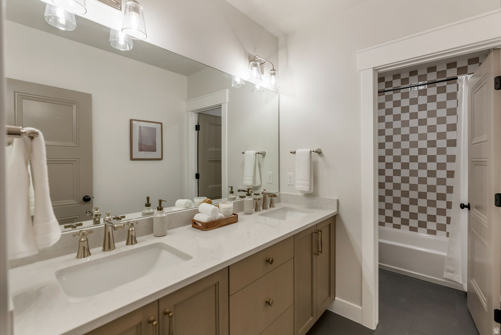 Dual vanity with integrated sinks, brushed nickel faucets, and a light-toned countertop
