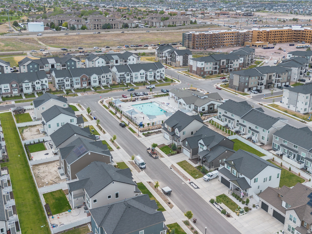 Aerial perspective of a contemporary residential development featuring multiple housing styles