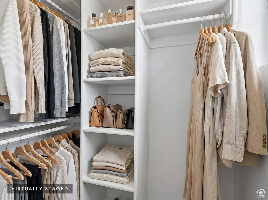 Integrated closet system featuring multiple hanging rods and shelving