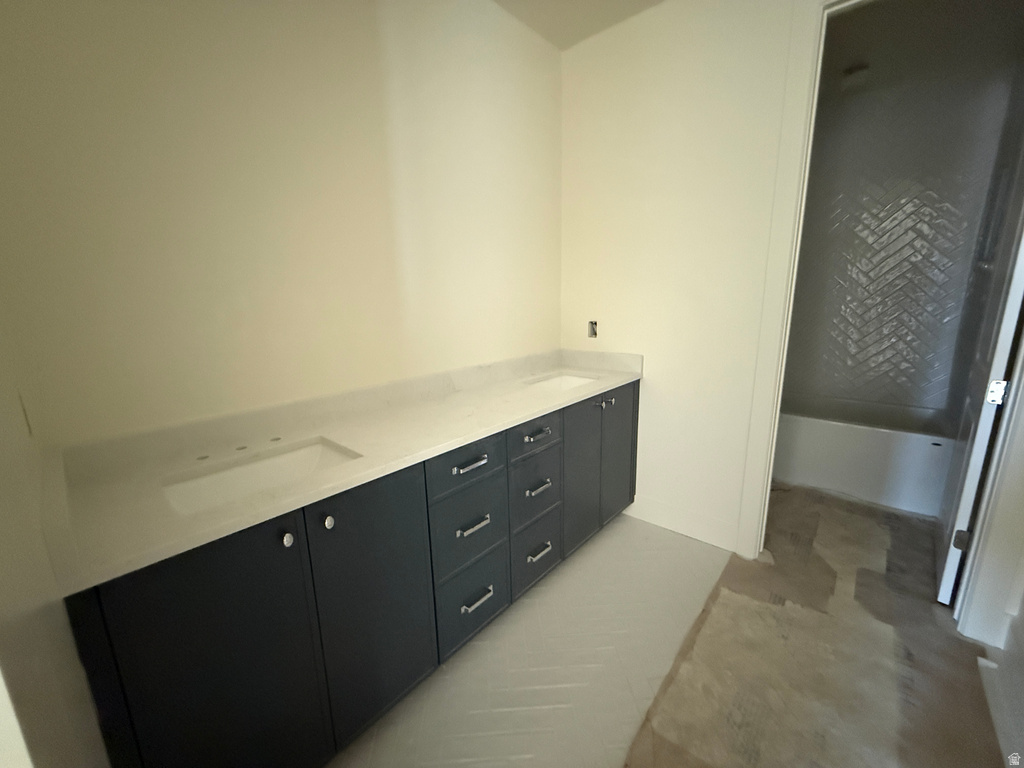 Dual vanity with integrated sinks and a light-toned countertop