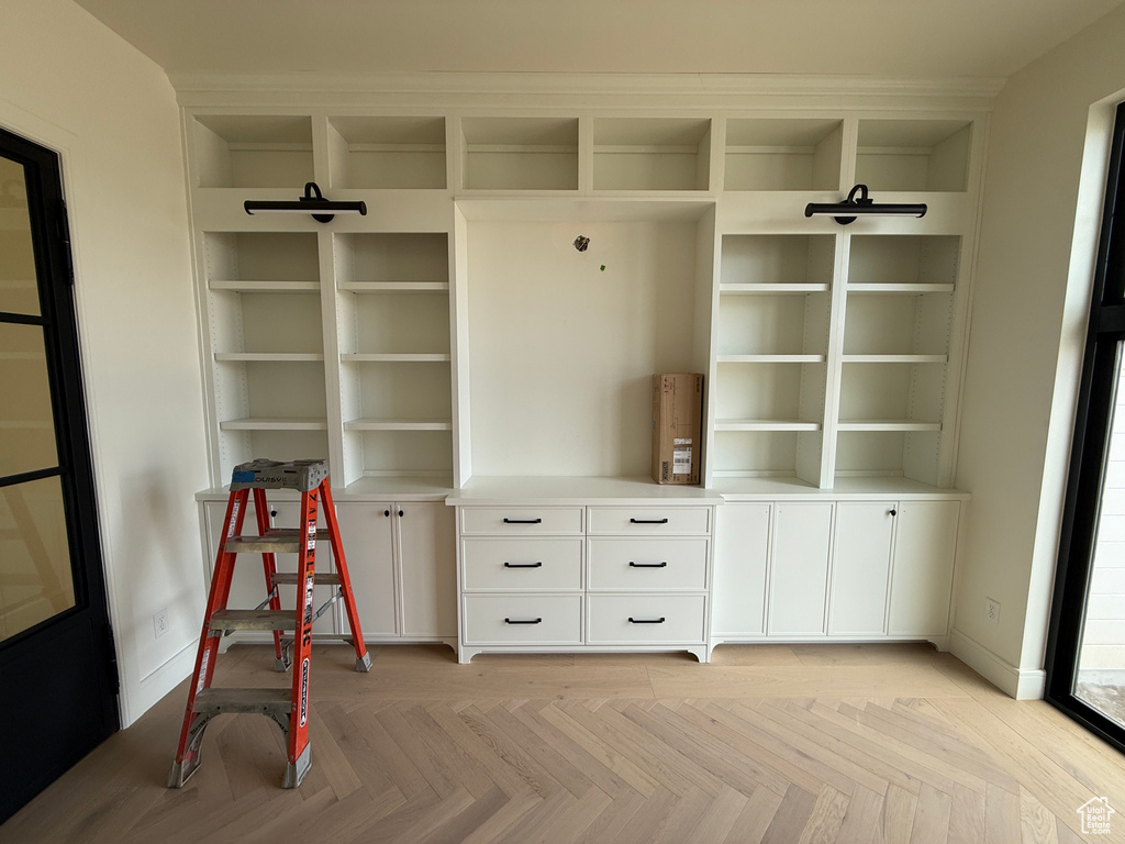 Custom built-in shelving with integrated cabinetry