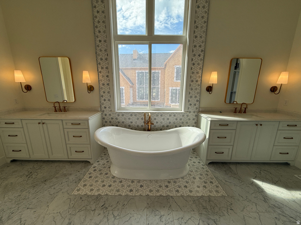 Dual vanity cabinets with stone countertops