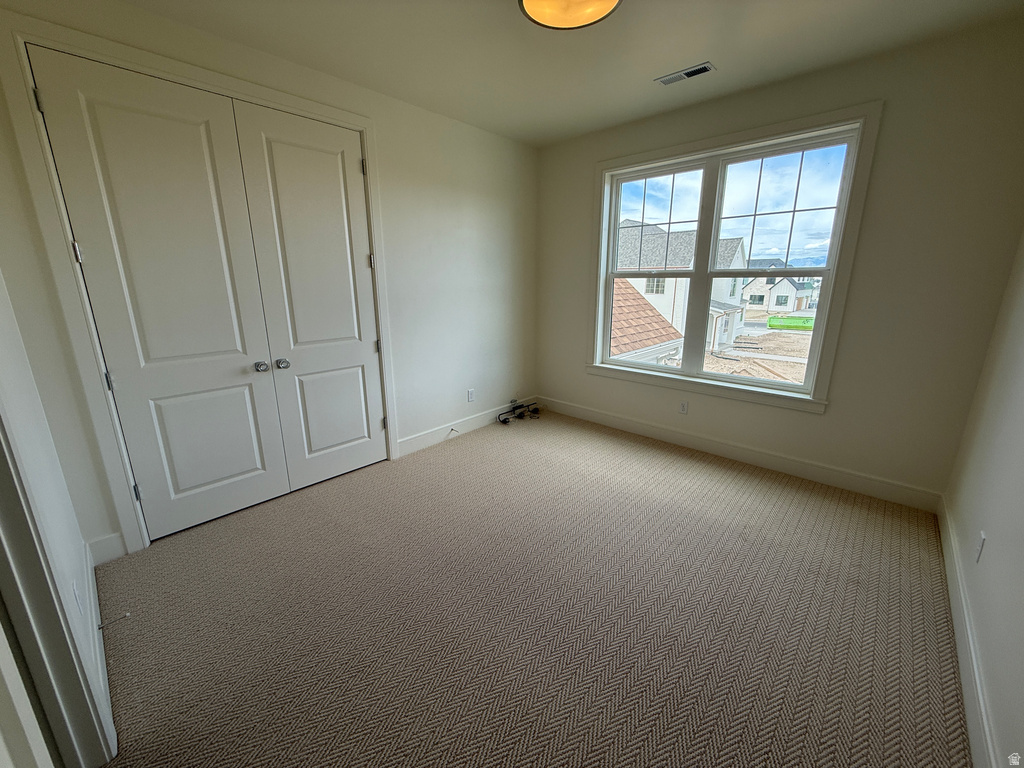 Double-door closet with polished hardware