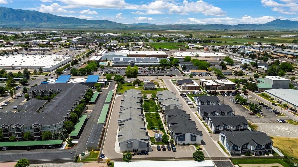 Aerial perspective highlighting a residential development with multiple buildings and surrounding infrastructure