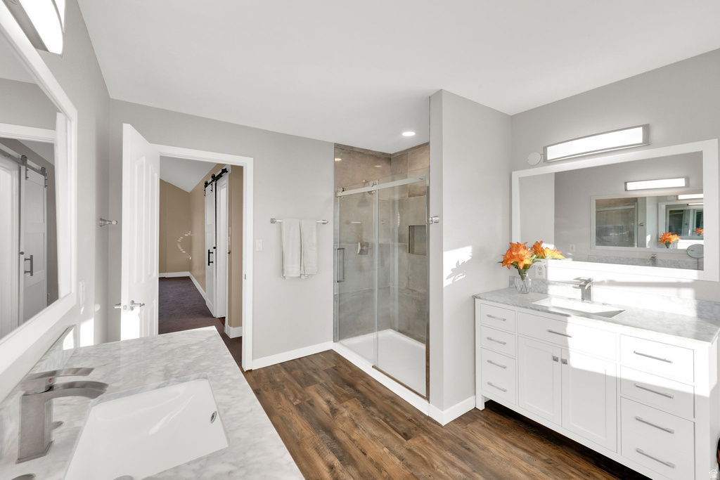 Dual vanity with white cabinetry and light-toned countertops