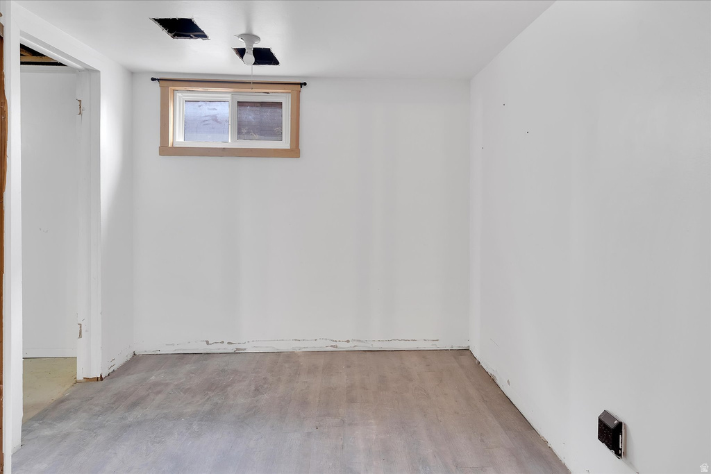 Neutral-toned flooring complemented by white walls