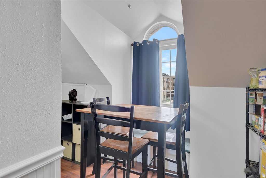 Hardwood-finish flooring complementing a high-top dining table
