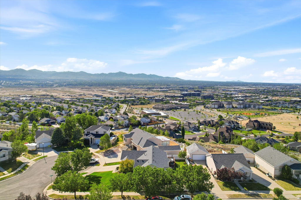 Aerial perspective showcasing a residential neighborhood with varied housing styles